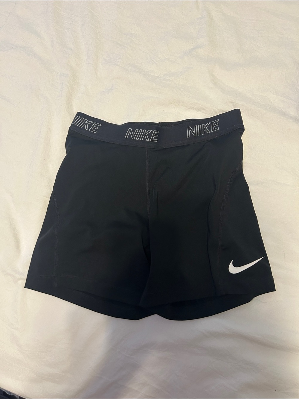 Nike Black Athletic Shorts with White Swoosh